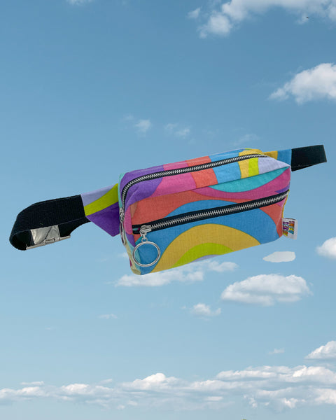 Rainbow swirl bumbag with black straps and zips