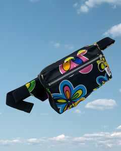 Product shot - silky black bumbag with large blue and pink neon flowers pattern